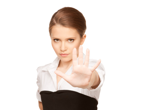 bright picture of young woman making stop gesture