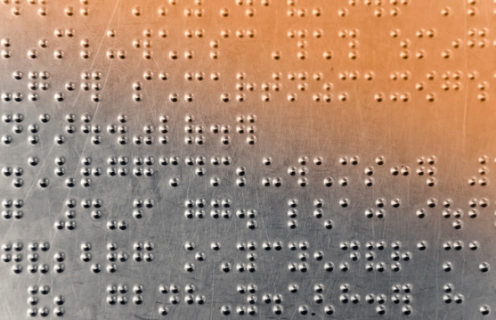 Metal sheet with braille dots background